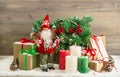 Christmas decoration Santa Claus burning candles gift boxes Royalty Free Stock Photo