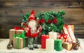 Christmas decoration Santa Claus burning candles gift boxes Royalty Free Stock Photo