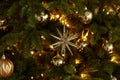 Christmas decoration in shape of golden star and balls. Merry Christmas and Happy New Year Royalty Free Stock Photo