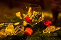 Christmas decoration, shiny colored stars in a glass