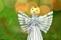 Christmas decoration, silver angel made of straw Royalty Free Stock Photo