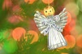 Christmas decoration, silver angel made of straw Royalty Free Stock Photo