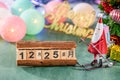 Christmas decoration, skating santa claus with Christmas imagery at december 25 isolated on green background Royalty Free Stock Photo