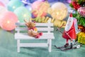 Christmas decoration, skating santa claus with reindeer decoration and Christmas imagery isolated on green background Royalty Free Stock Photo