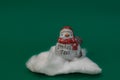 Christmas decoration. small figure with `Merry Christmas` lettering on the front Royalty Free Stock Photo