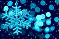 Christmas decoration snowflake on defocused lights