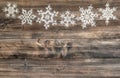Christmas decoration Snowflakes border wooden background