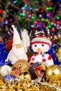 Christmas decoration, Snowman, Santa, balls, tinsel on blurred lights background Royalty Free Stock Photo