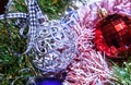 Christmas decoration, star on colorful garlands. Royalty Free Stock Photo