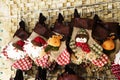 Christmas decoration stocking and toys hanging over rustic stone background Royalty Free Stock Photo