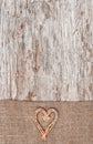 Christmas decoration with straw heart and burlap Royalty Free Stock Photo