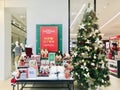 Christmas decoration table selling outside the department store. Close up view. Royalty Free Stock Photo