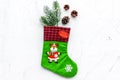 Christmas decoration. Traditional festive socks with spruce branch and pine cones on white background top view copy Royalty Free Stock Photo