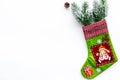 Christmas decoration. Traditional festive socks with spruce branch and pine cones on white background top view copy Royalty Free Stock Photo