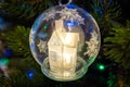 Christmas decoration for Christmas tree snow glowing fairy house in a glass bowl