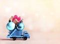 Christmas decoration. Truck car carries decorations for Christmas trees. Christmas ball Royalty Free Stock Photo