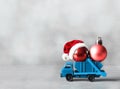 Christmas decoration. Truck car carries decorations for Christmas trees. Christmas ball Royalty Free Stock Photo