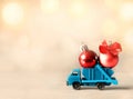 Christmas decoration. Truck car carries decorations for Christmas trees. Christmas ball Royalty Free Stock Photo