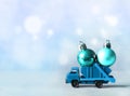 Christmas decoration. Truck car carries decorations for Christmas trees. Christmas ball Royalty Free Stock Photo