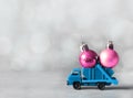 Christmas decoration. Truck car carries decorations for Christmas trees. Christmas ball Royalty Free Stock Photo