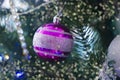 Christmas decoration violet ball close up boke