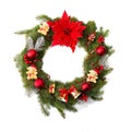 Christmas decoration. Wreath of flower of red poinsettia, branch christmas tree, ball, bears, red berries on a white background Royalty Free Stock Photo