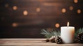 Christmas decoration with white burning candles on wooden table against bokeh light background Royalty Free Stock Photo