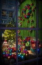 Christmas decoration. Window at night Lights ornaments Royalty Free Stock Photo