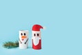 Christmas decoration for winter season. Holiday easy DIY craft idea for kids. Toilet paper roll tube toy. Santa snowman Royalty Free Stock Photo