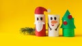 Christmas decoration for winter season. Holiday easy DIY craft idea for kids. Toilet paper roll tube toy. Santa snowman Royalty Free Stock Photo