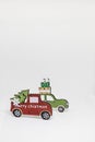 Christmas decoration with wooden cars, gifts with copy space. Season greeting card, party invitation, christmas