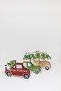 Christmas decoration with wooden cars, gifts with copy space. Season greeting card, party invitation, christmas