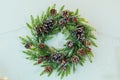 Christmas decoration, wreath of Christmas trees with cones close-up decoration for home and doors Royalty Free Stock Photo