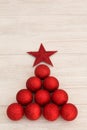 Christmas decorations arranged in tree shape Royalty Free Stock Photo