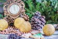 Christmas decorations with balls, fir branches, cones on an old wooden background Royalty Free Stock Photo