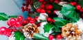 Christmas decorations with beautiful classic Christmas red with pine cones and baxxhe as tradition dictates Royalty Free Stock Photo