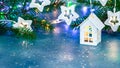 Christmas decorations on blue background with glittering star confetti Royalty Free Stock Photo
