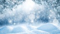 Christmas decorations in  blue and white colors with blurred snowy winter outside. Royalty Free Stock Photo