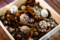 Christmas decorations in a box. Christmas concept. Christmas balls, pine cones, garlands Royalty Free Stock Photo