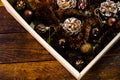 Christmas decorations in a box. Christmas concept. Christmas balls, pine cones, garlands Royalty Free Stock Photo