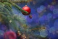 Christmas decorations in bright shiny colors with Christmas lights and blurred background. Royalty Free Stock Photo