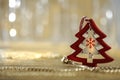 Christmas decorations in bright shiny colors with Christmas lights and blurred background. Royalty Free Stock Photo