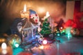 Christmas decorations, burning candles, garlands, lights, balls Royalty Free Stock Photo