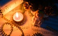 Christmas decorations, candles, figures of angels and notes Royalty Free Stock Photo