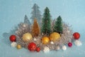 Christmas decorations. Colorful Christmas baubles and silver tinsel Royalty Free Stock Photo