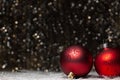 Christmas decorations composition view of two red evening balls with red glitter snowflakes Royalty Free Stock Photo