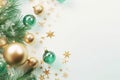 Christmas decorations concept. Top view photo of pine branches in the snow with gold-green transparent baubles star ornaments and Royalty Free Stock Photo