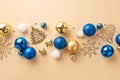 Christmas decorations concept. Top view photo of snowflake fir jingle bell ornaments white blue gold baubles and confetti on Royalty Free Stock Photo