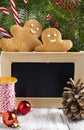 Christmas decorations with cookies and chalk blackboard Royalty Free Stock Photo