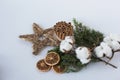 Christmas decorations eco cotton flowers, cinnamon,stars, spruce branches and jute rope hank over white background,holiday,xmas,ch Royalty Free Stock Photo